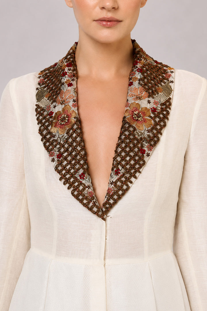 Ivory A-Line Gown With Embroidered Lapel Collar And Statement Cuffs.