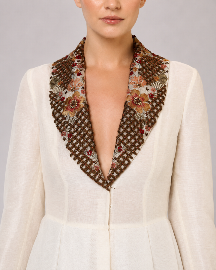 Ivory A-Line Gown With Embroidered Lapel Collar And Statement Cuffs.