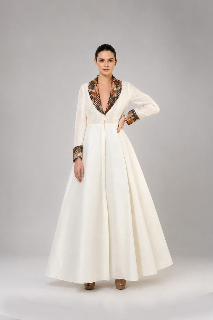 Ivory A-Line Gown With Embroidered Lapel Collar And Statement Cuffs.