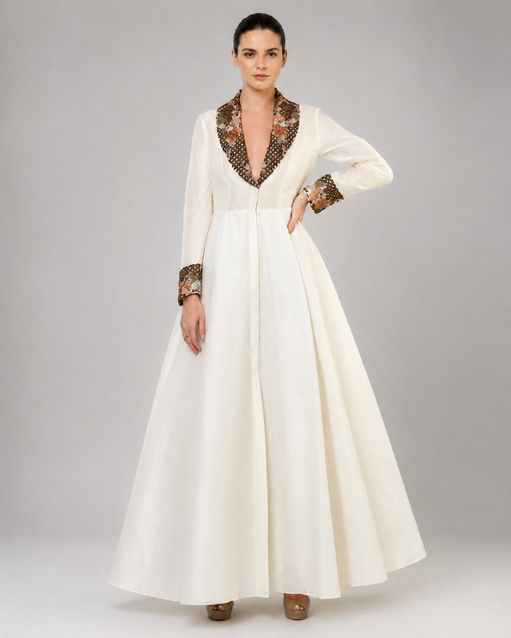 Ivory A-Line Gown With Embroidered Lapel Collar And Statement Cuffs.