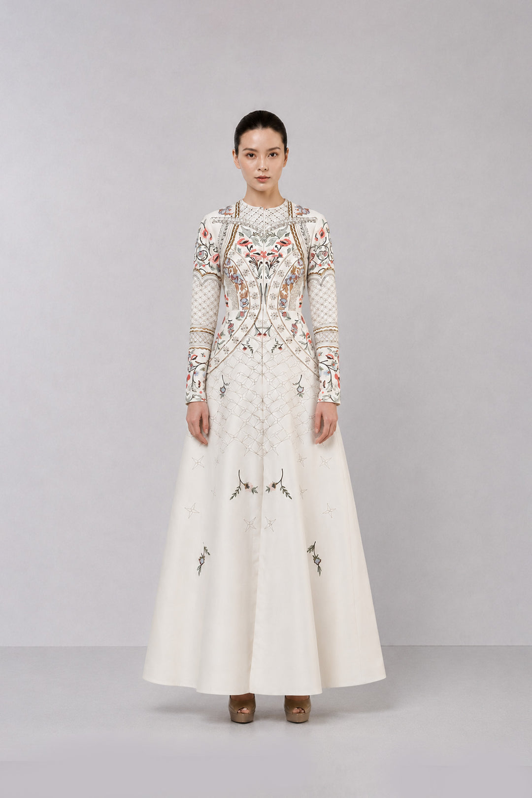 Ivory Embroidered Gown With Architectural Paneling And Intricate Floral Motifs.