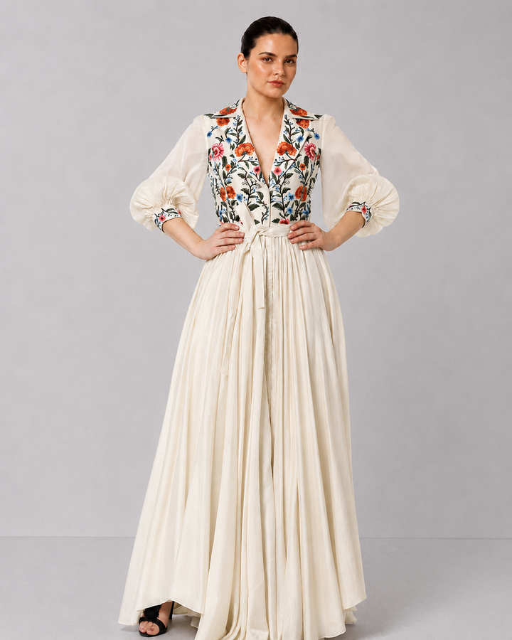 Ivory Embroidered Gown With Floral Lapel Collar Featuring Gathers And Bishop Sleeves.