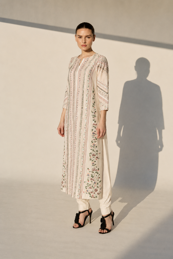 Ivory Embroidered Kurta Set With Floral Panel Detailing And Contrast-Edged Dupatta.