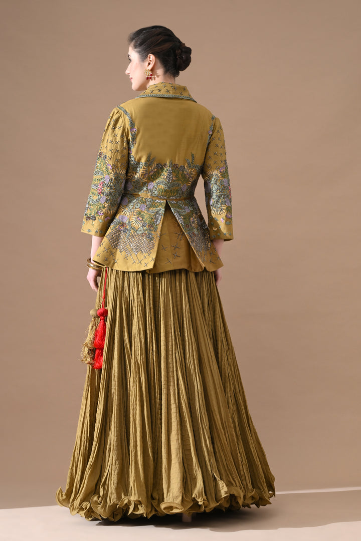 A Olive Green Jacket Features Intricate All-Over Embroidery With Skirt