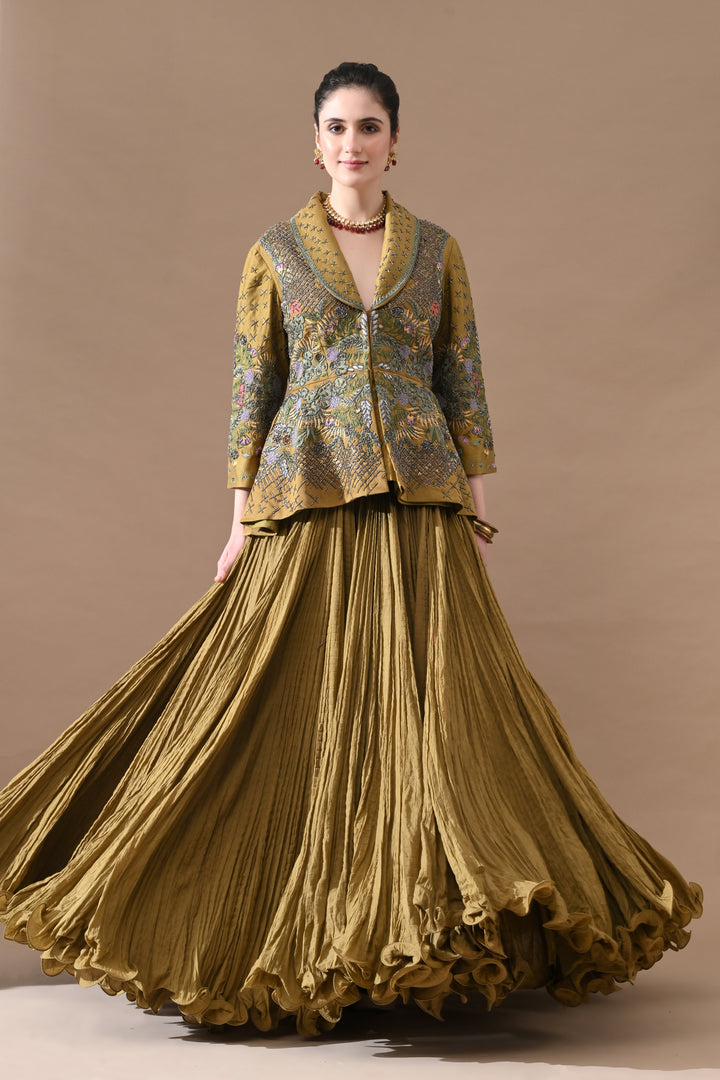 A Olive Green Jacket Features Intricate All-Over Embroidery With Skirt