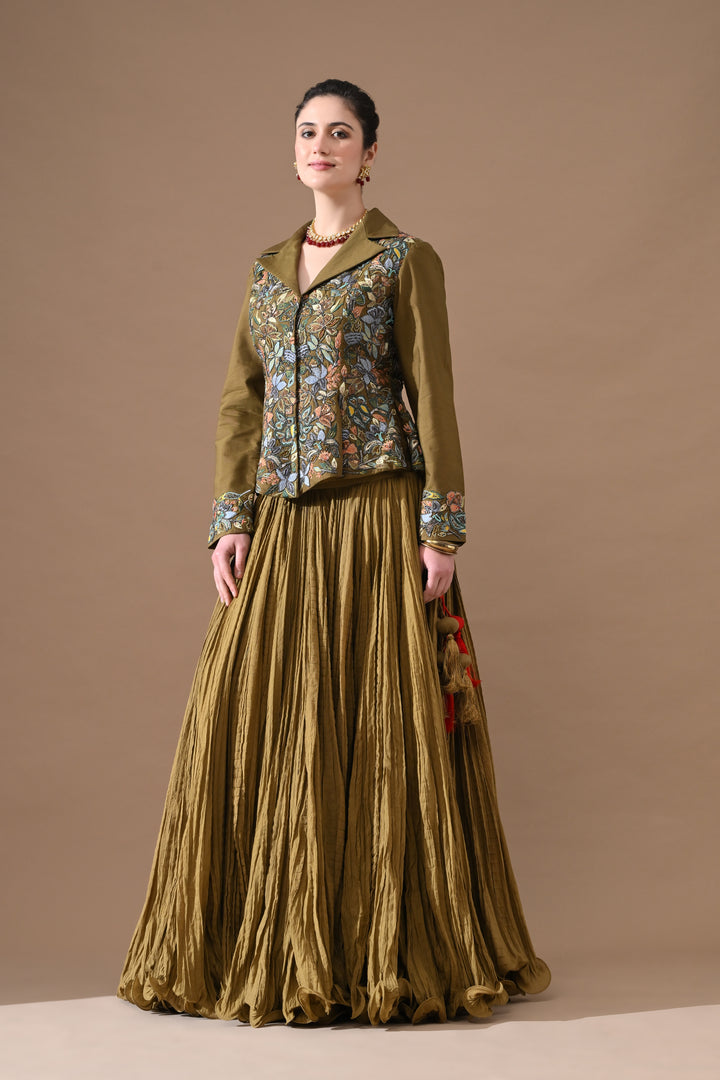 A Olive Green Jacket Features Intricate All-Over Embroidery With Skirt
