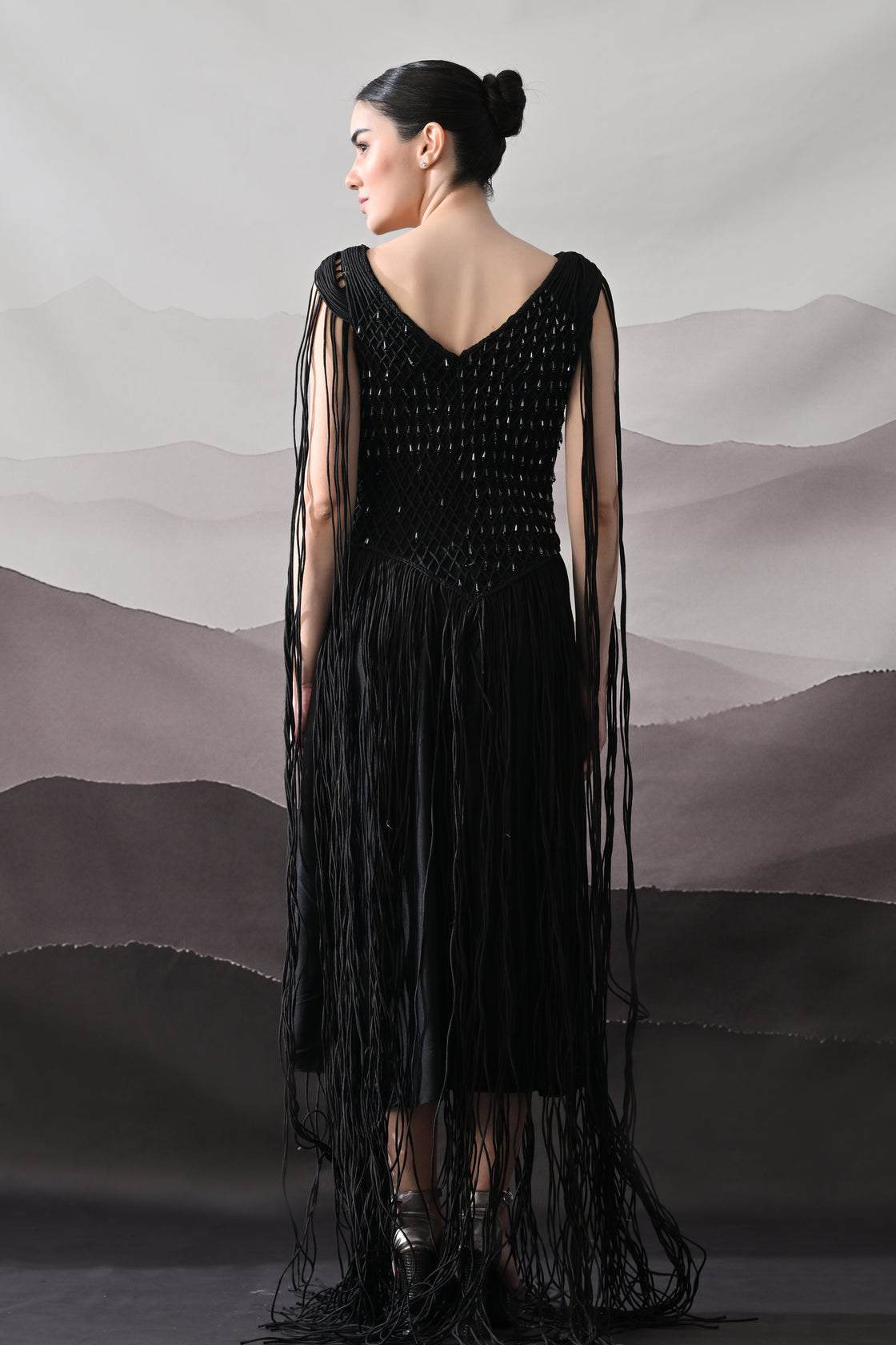 Black Gown with Artisanal Weave and Fringe Detailing