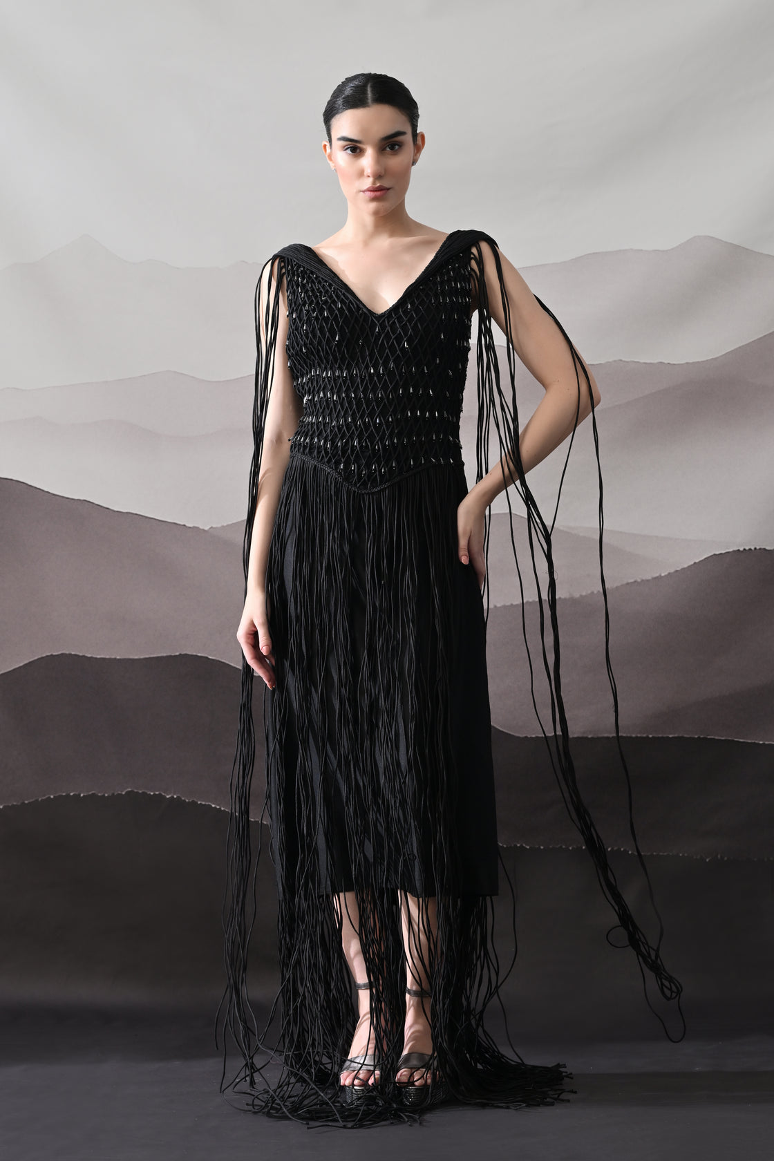 Black Gown with Artisanal Weave and Fringe Detailing