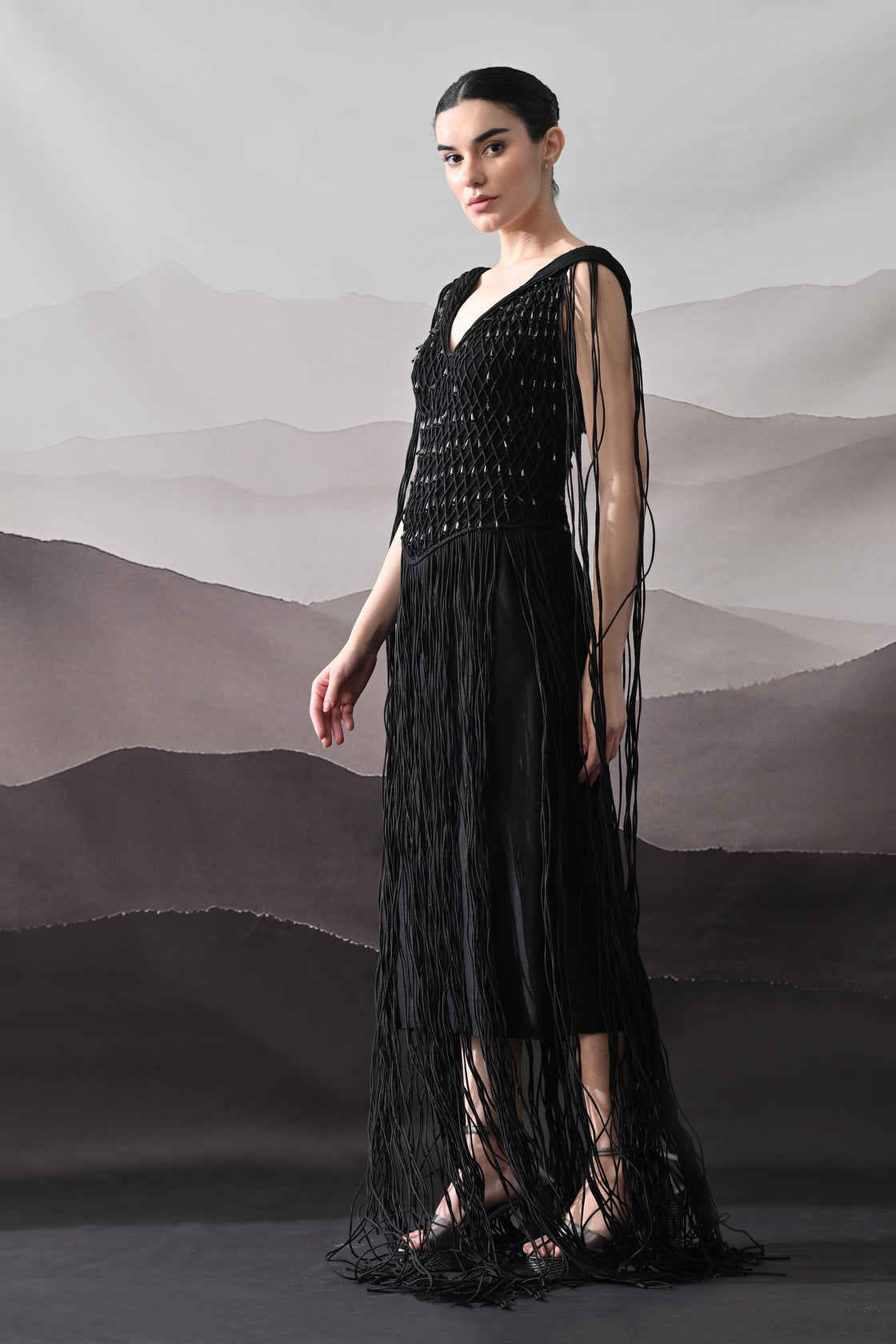 Black Gown with Artisanal Weave and Fringe Detailing