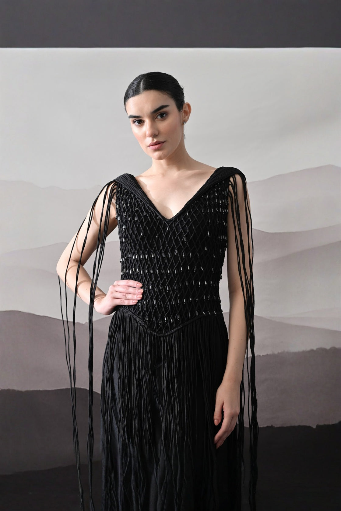 Black Gown With Artisanal Weave And Fringe Detailing