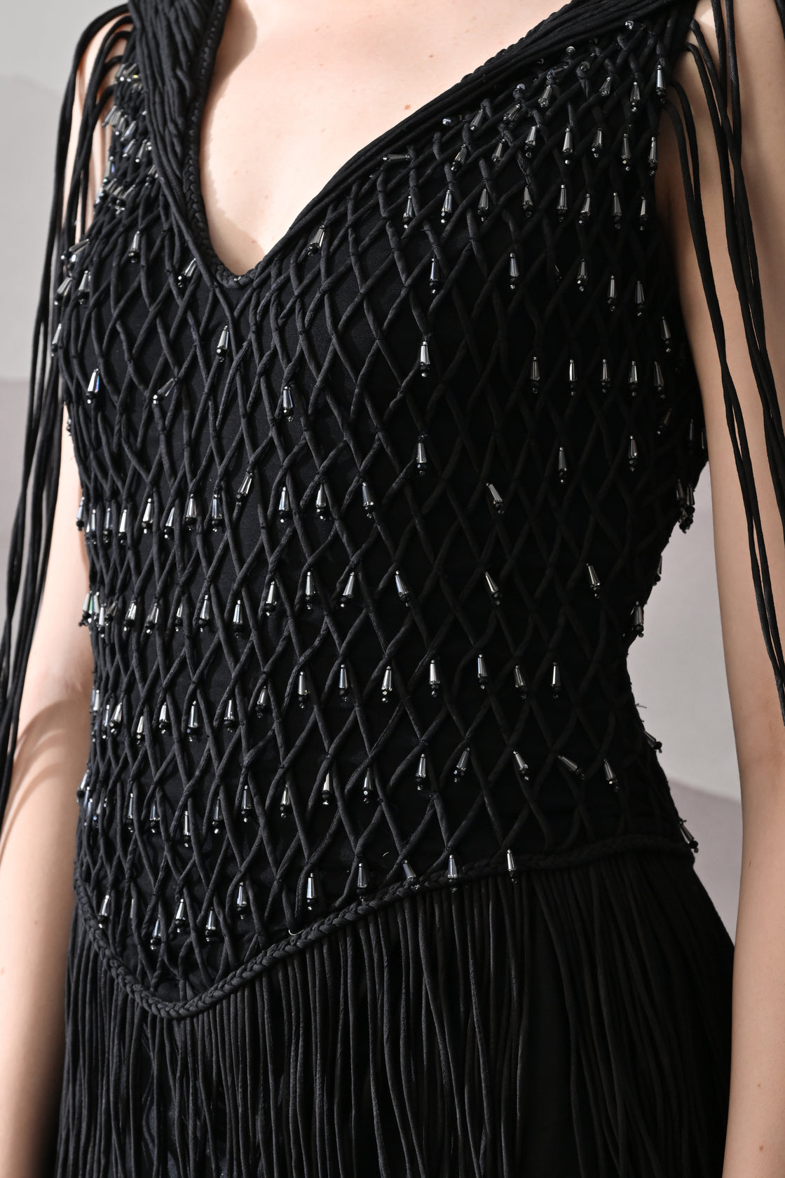 Black Gown with Artisanal Weave and Fringe Detailing