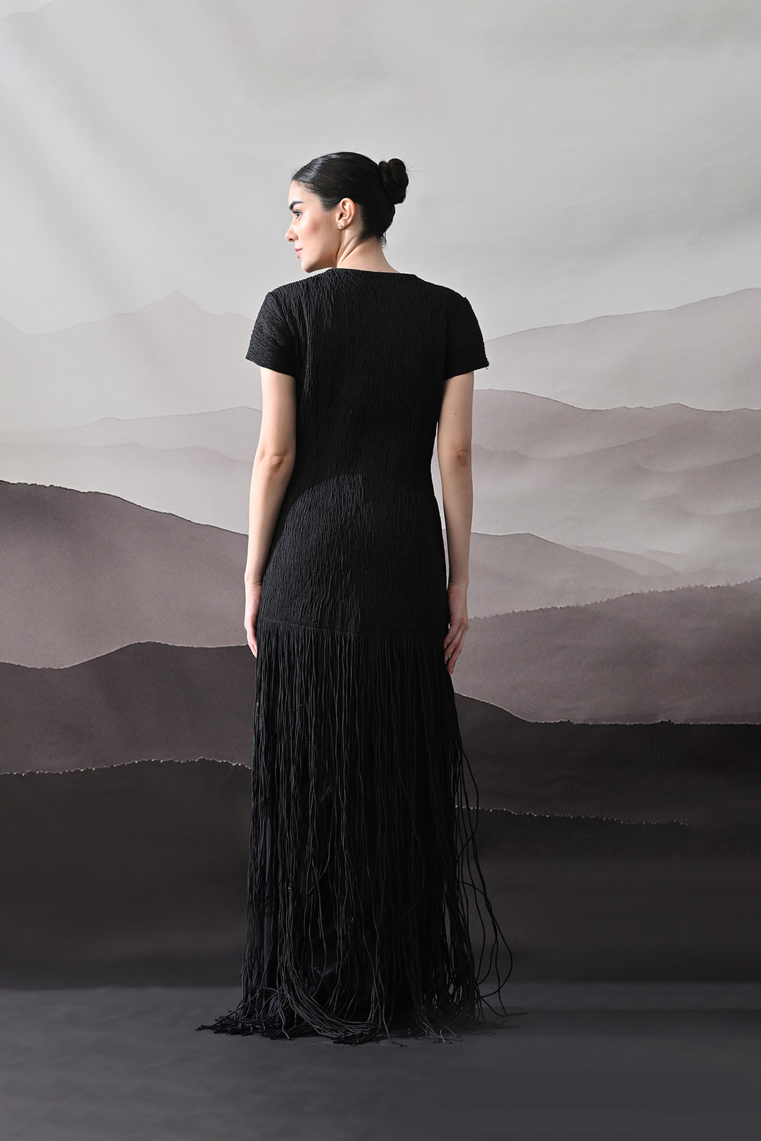 Black V-Neck Gown With Linear Texture And Fringe