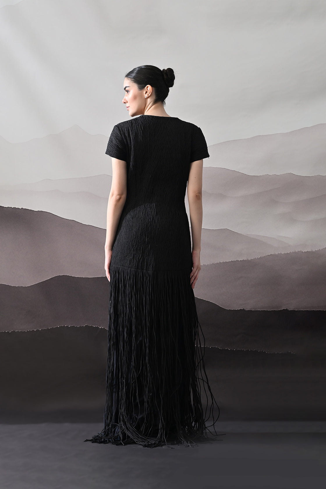 Black V-Neck Gown With Linear Texture And Fringe
