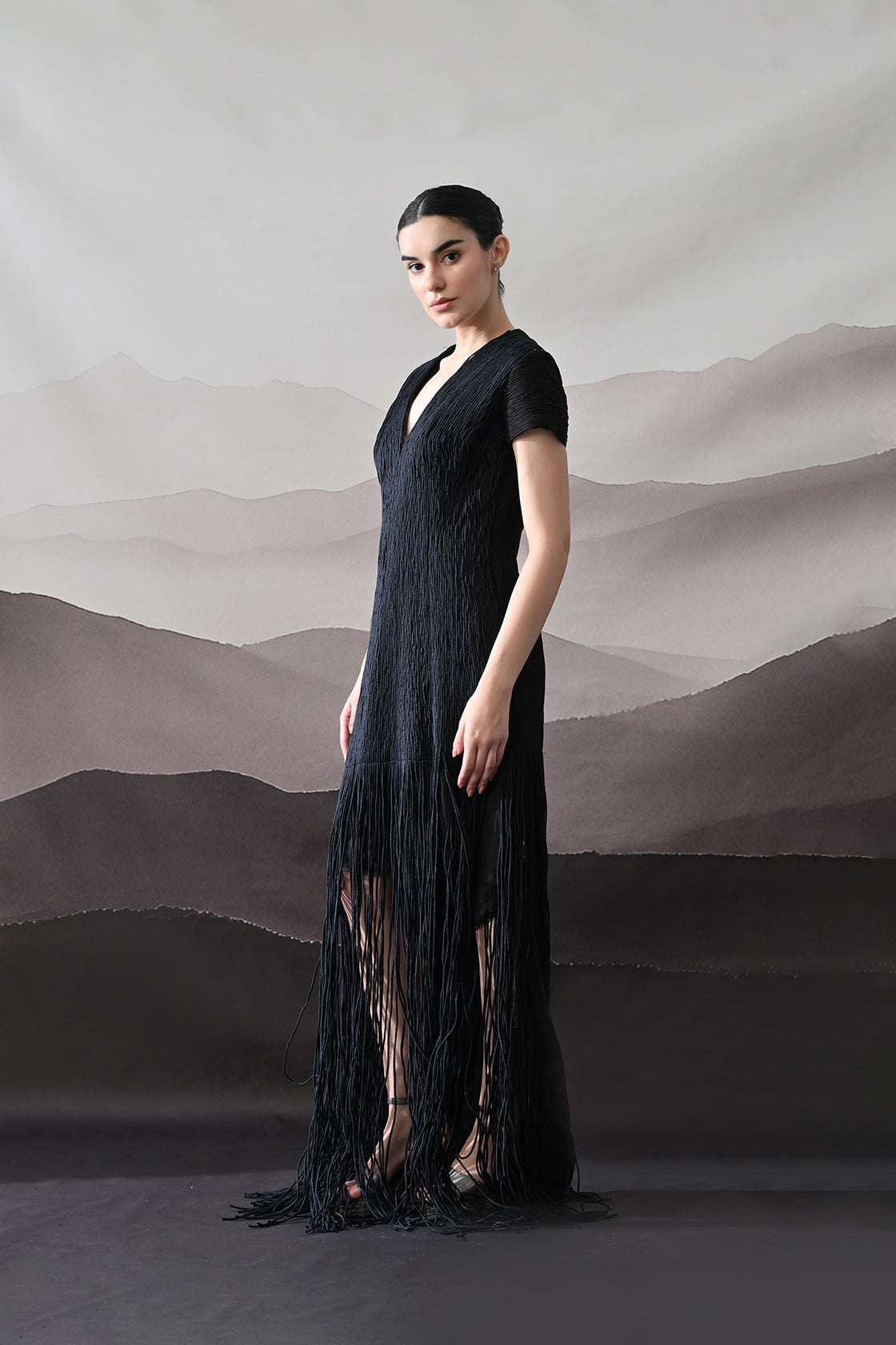 Black V-Neck Gown With Linear Texture And Fringe