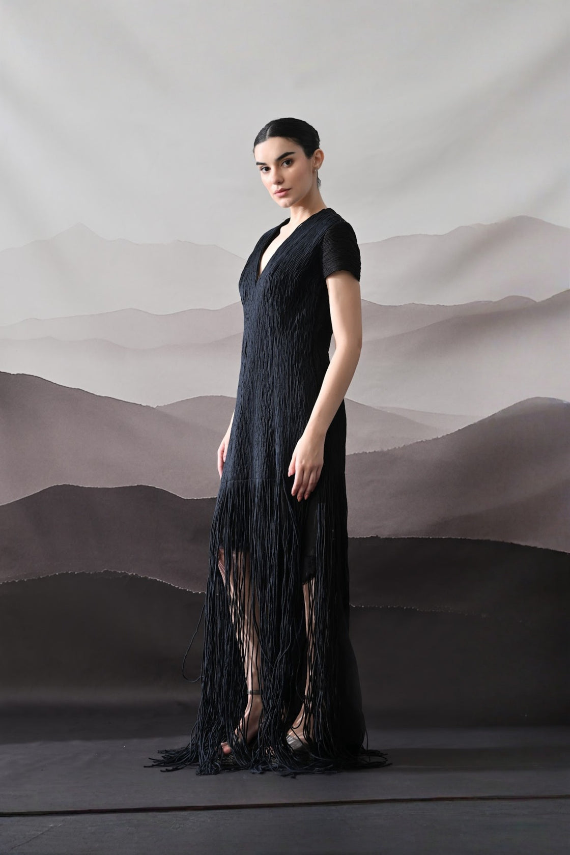 Black V-Neck Gown With Linear Texture And Fringe