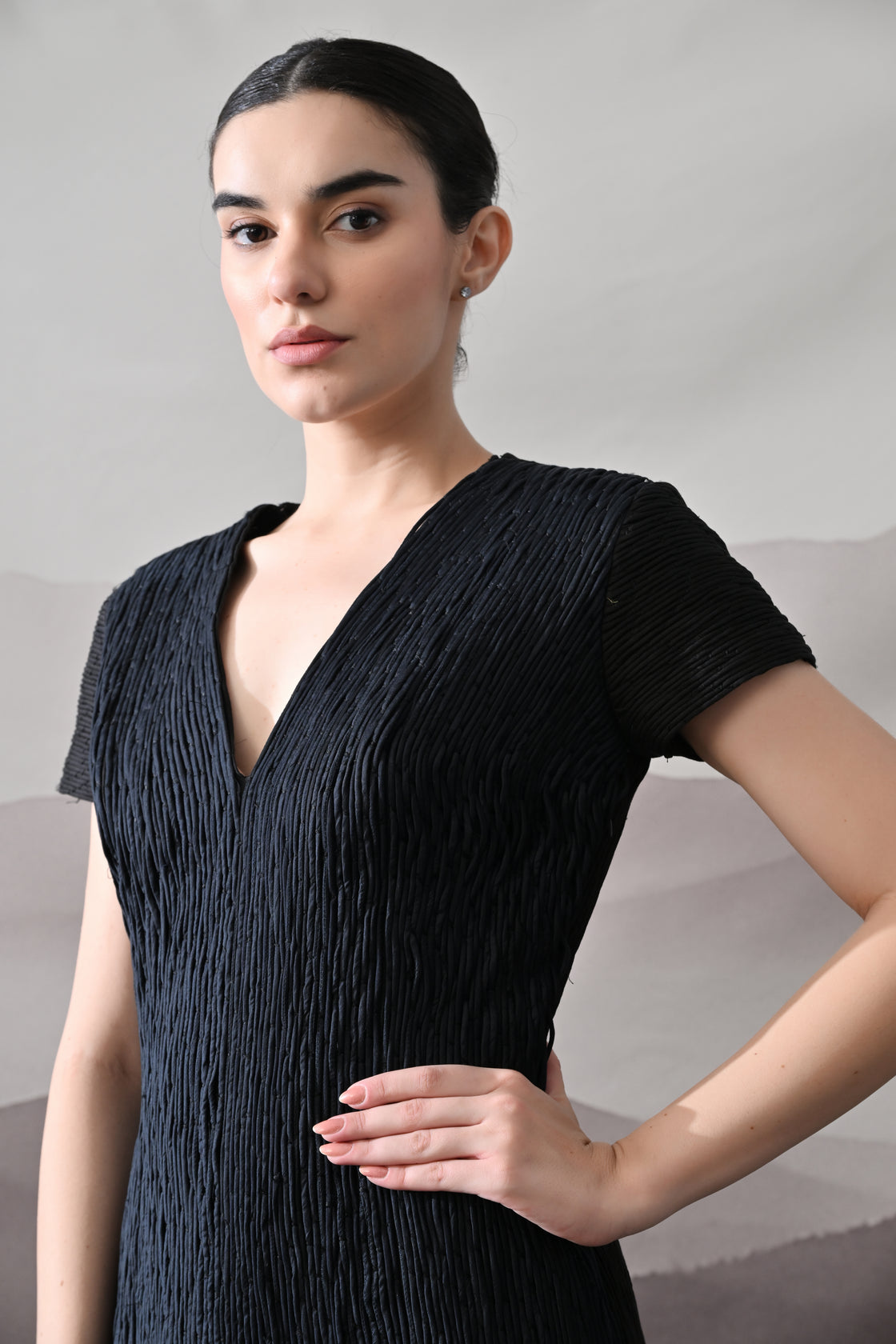 Black V-Neck Gown with Linear Texture and Fringe