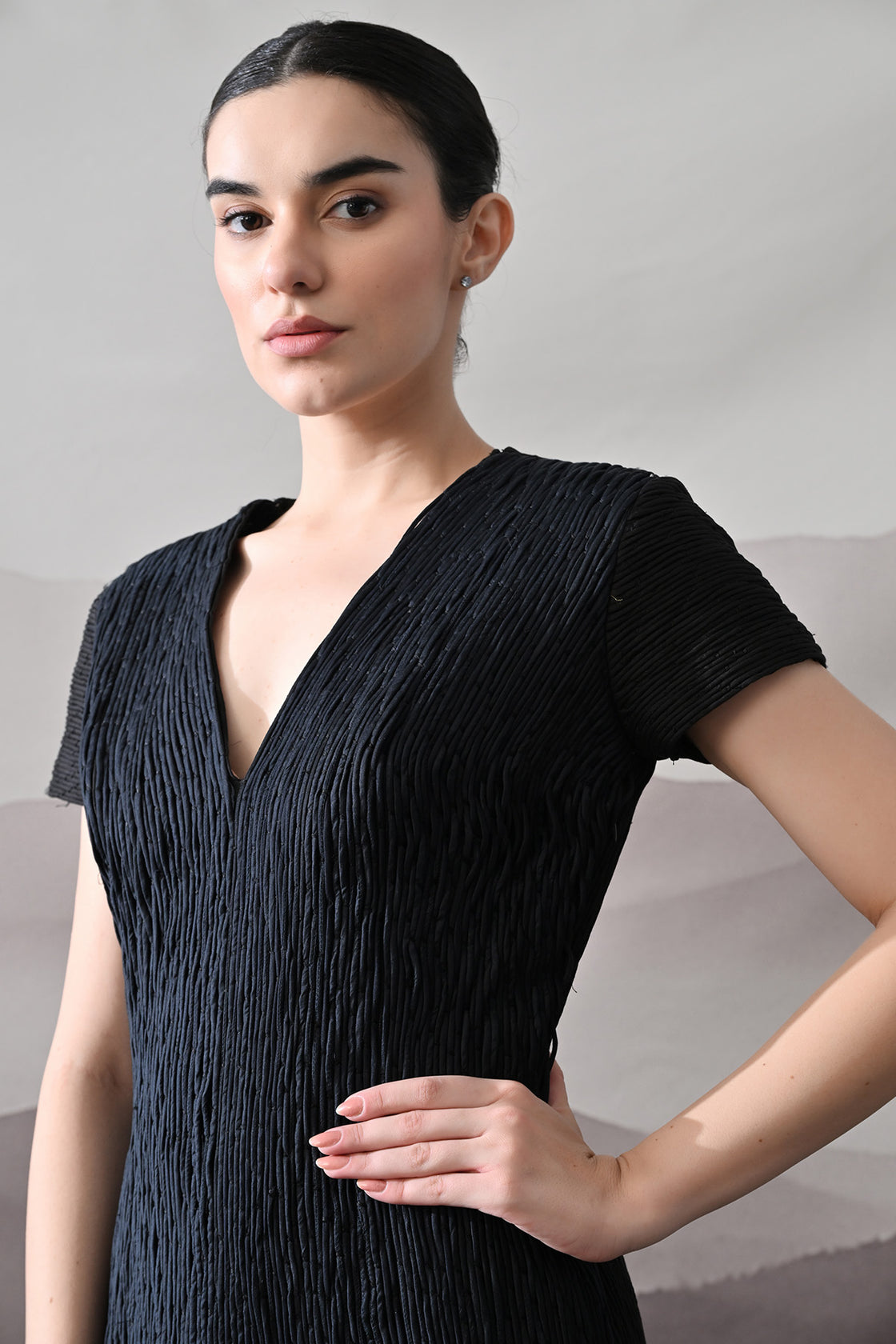 Black V-Neck Gown With Linear Texture And Fringe