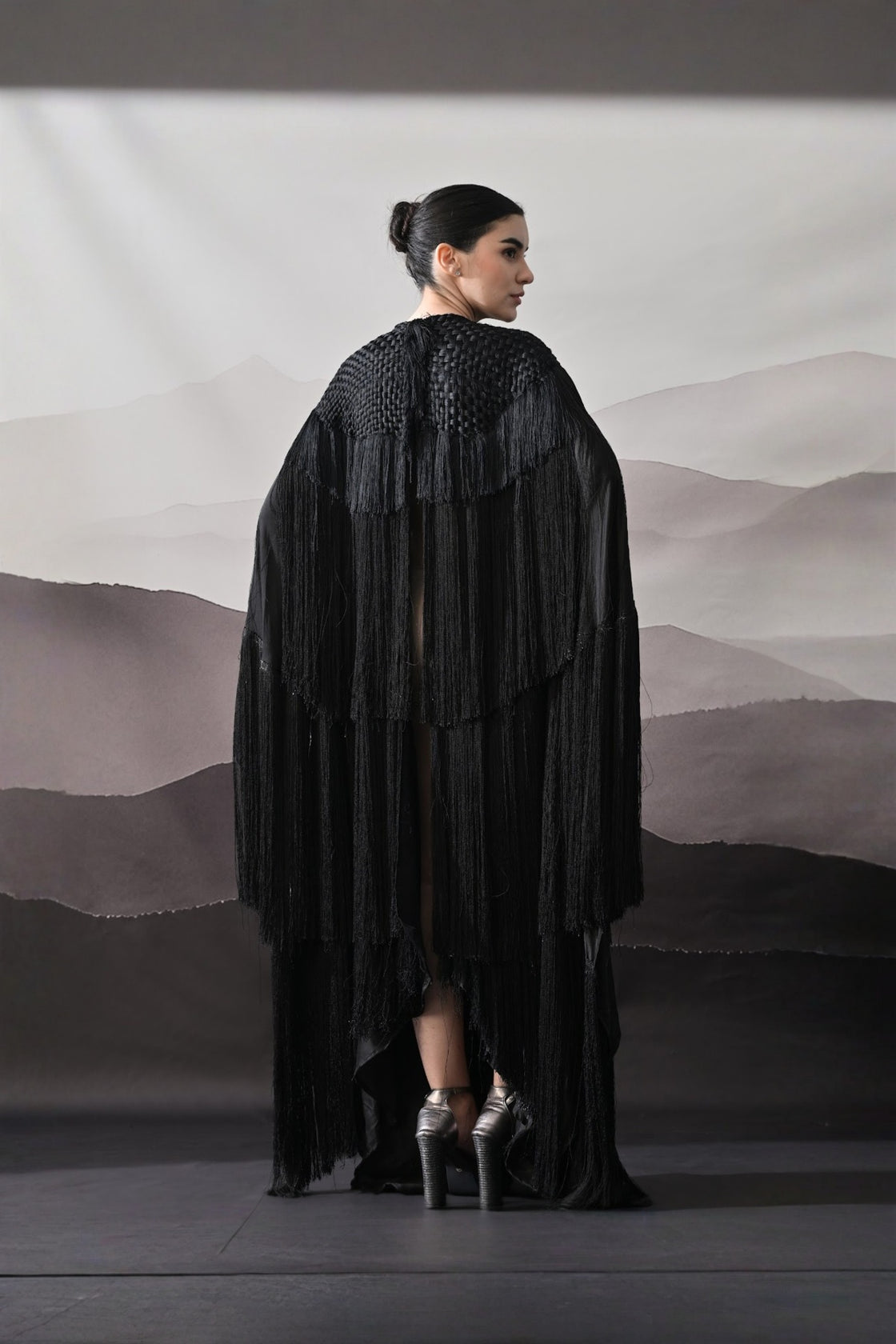 Black Gown With Handworked Yoke And Cascading Fringe