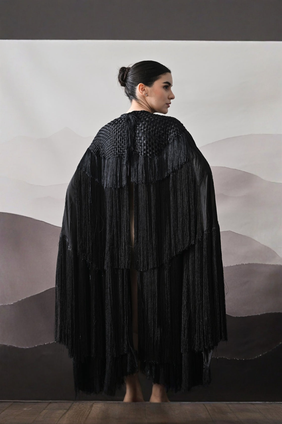 Black Gown With Handworked Yoke And Cascading Fringe