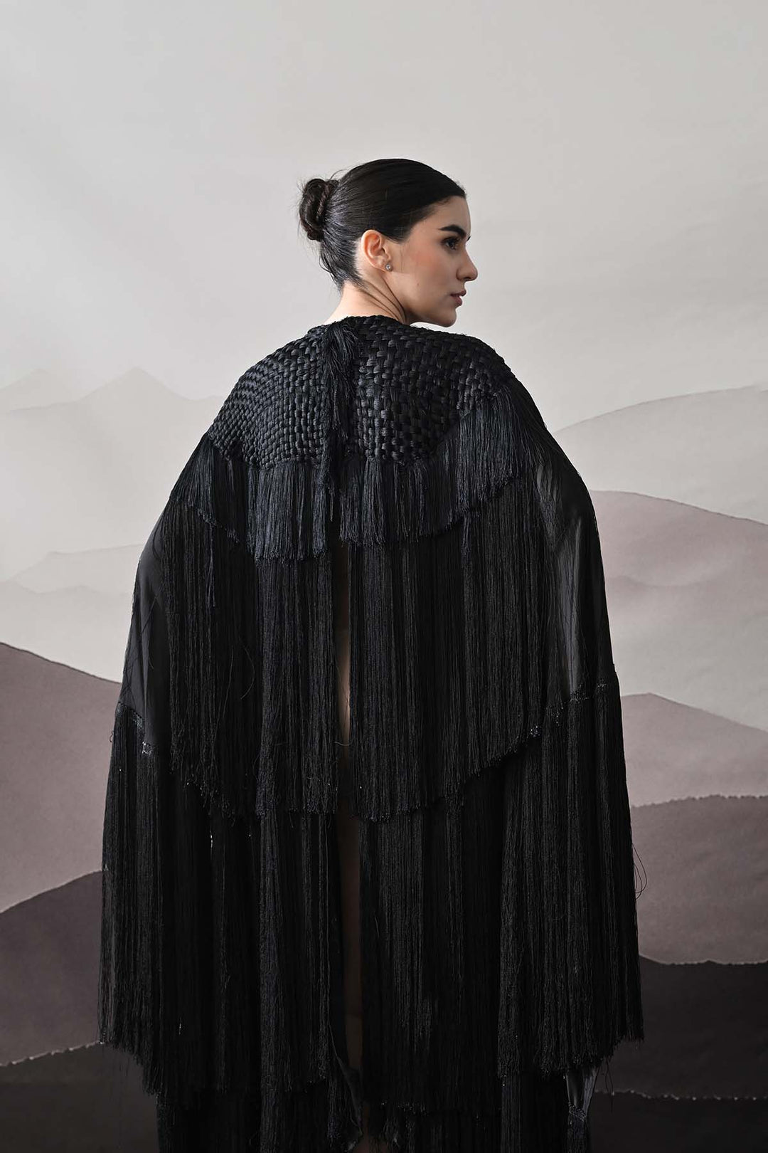 Black Gown With Handworked Yoke And Cascading Fringe