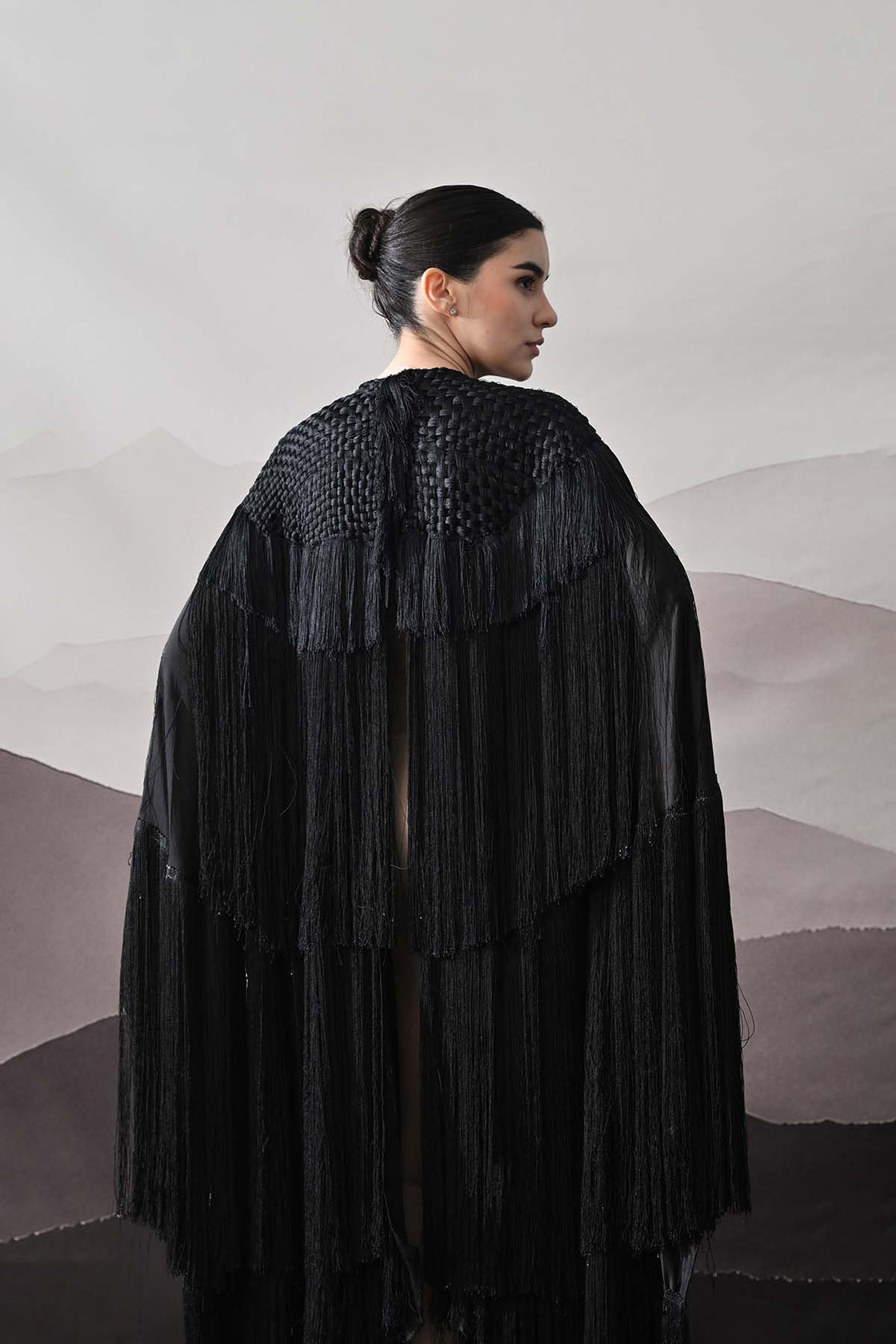 Black Gown With Handworked Yoke And Cascading Fringe