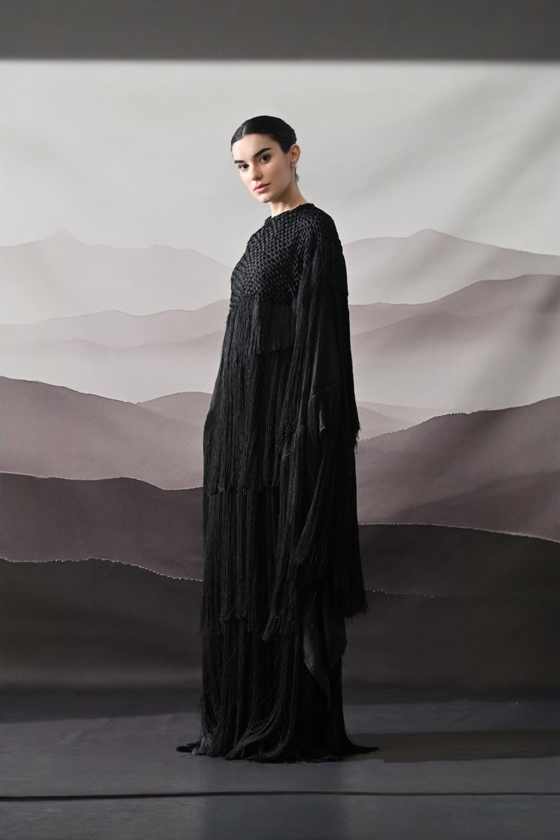 Black Gown With Handworked Yoke And Cascading Fringe
