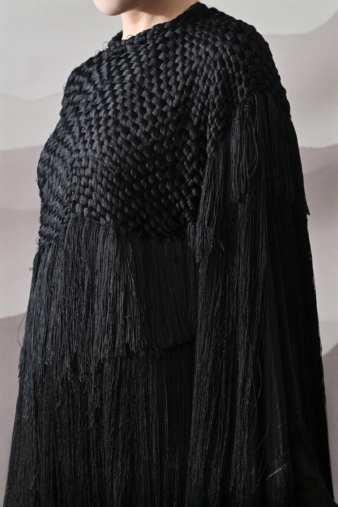 Black Gown With Handworked Yoke And Cascading Fringe