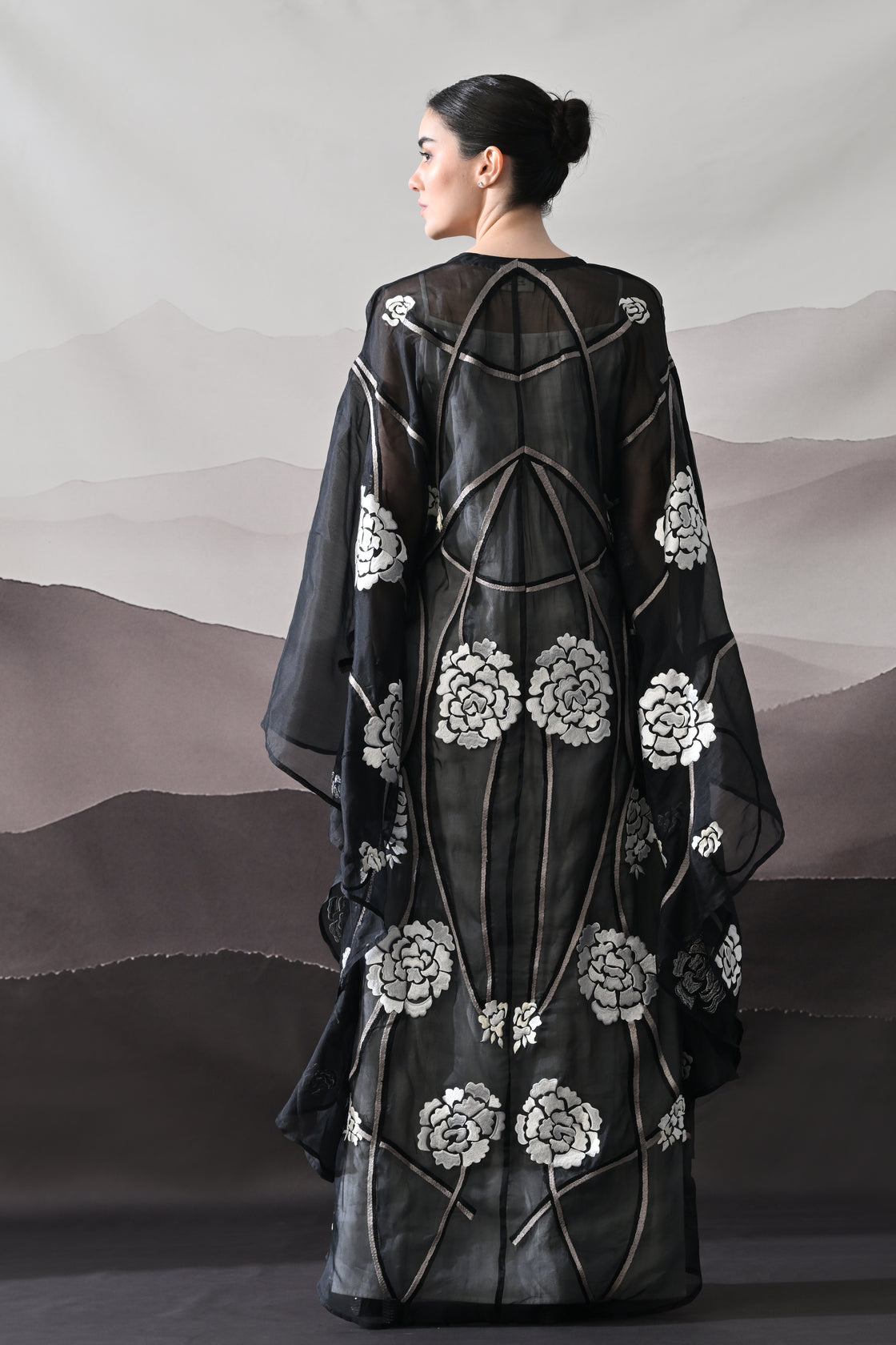 Black Kaftan with Handcrafted Florals and Architectural Lines