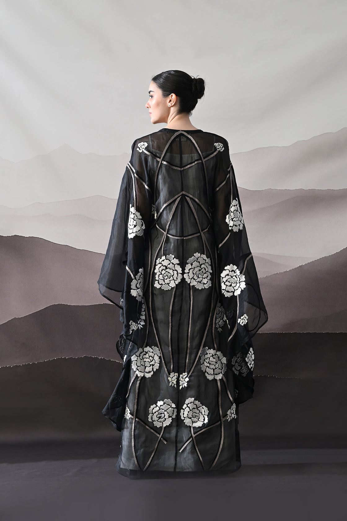 Black Kaftan With Handcrafted Florals And Architectural Lines