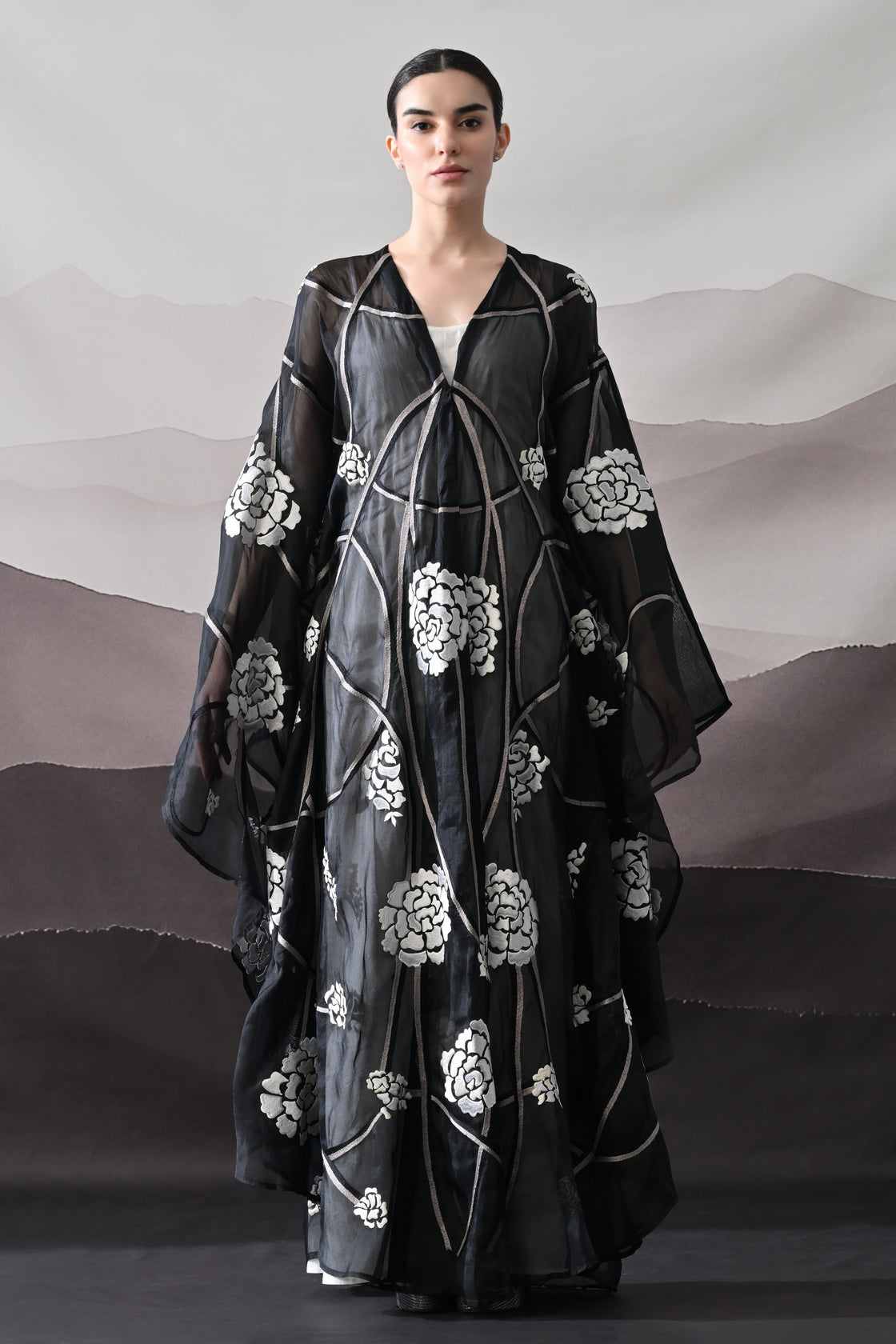 Black Kaftan with Handcrafted Florals and Architectural Lines
