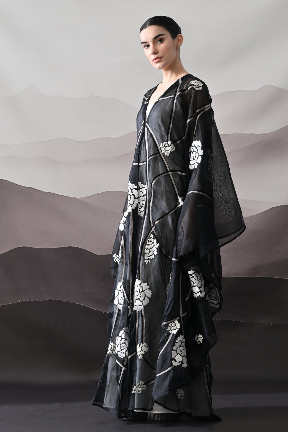 Black Kaftan with Handcrafted Florals and Architectural Lines