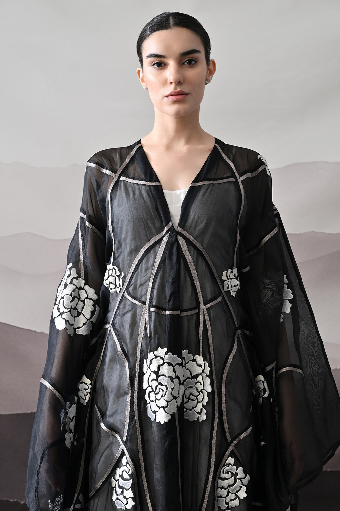 Black Kaftan With Handcrafted Florals And Architectural Lines