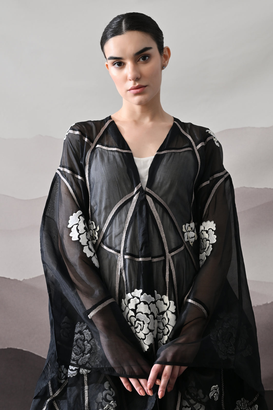 Black Kaftan with Handcrafted Florals and Architectural Lines