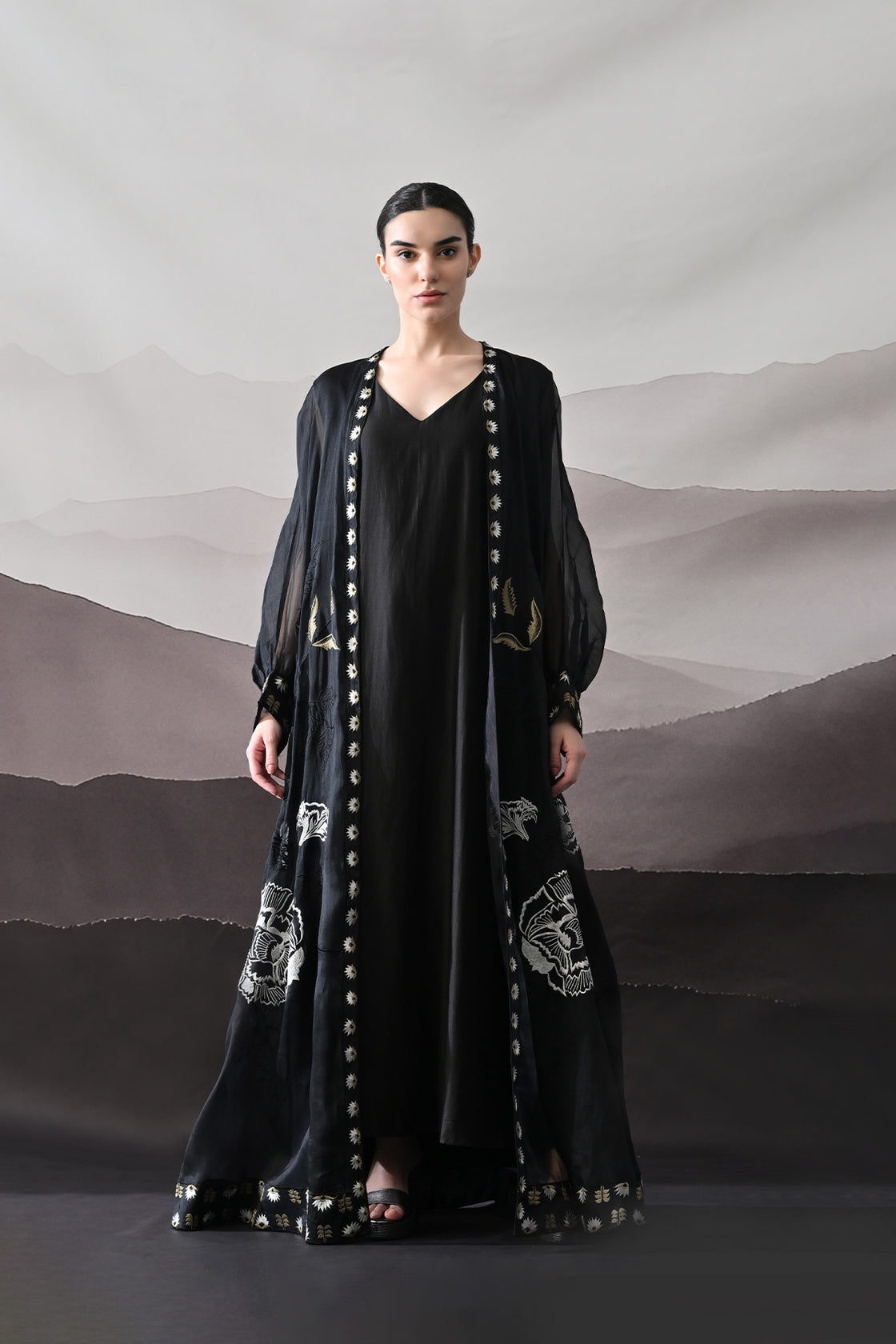 Black Kaftan With Handcrafted Borders And Fluid Silhouette