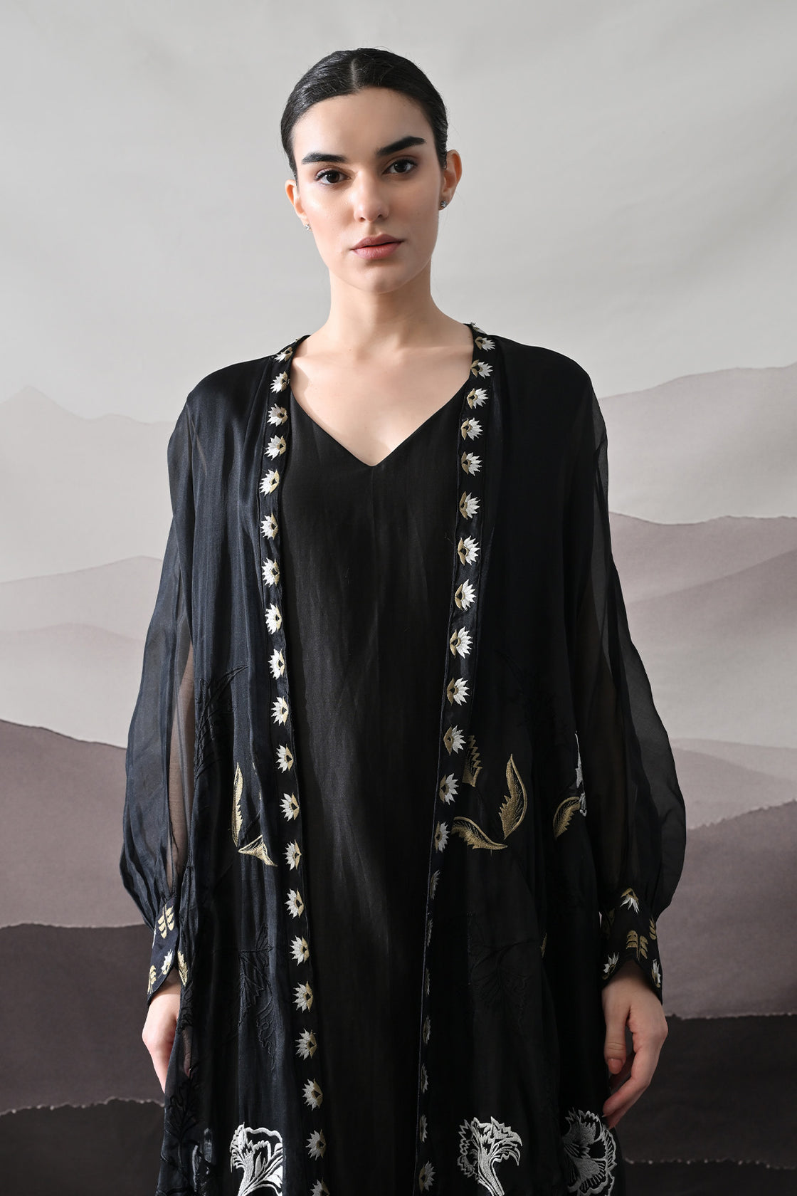 Black Kaftan With Handcrafted Borders And Fluid Silhouette