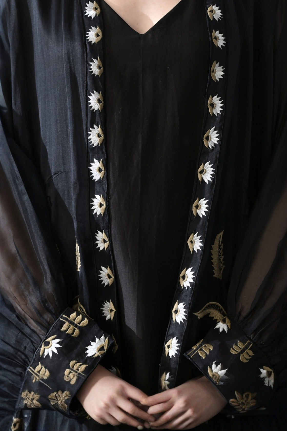 Black Kaftan With Handcrafted Borders And Fluid Silhouette
