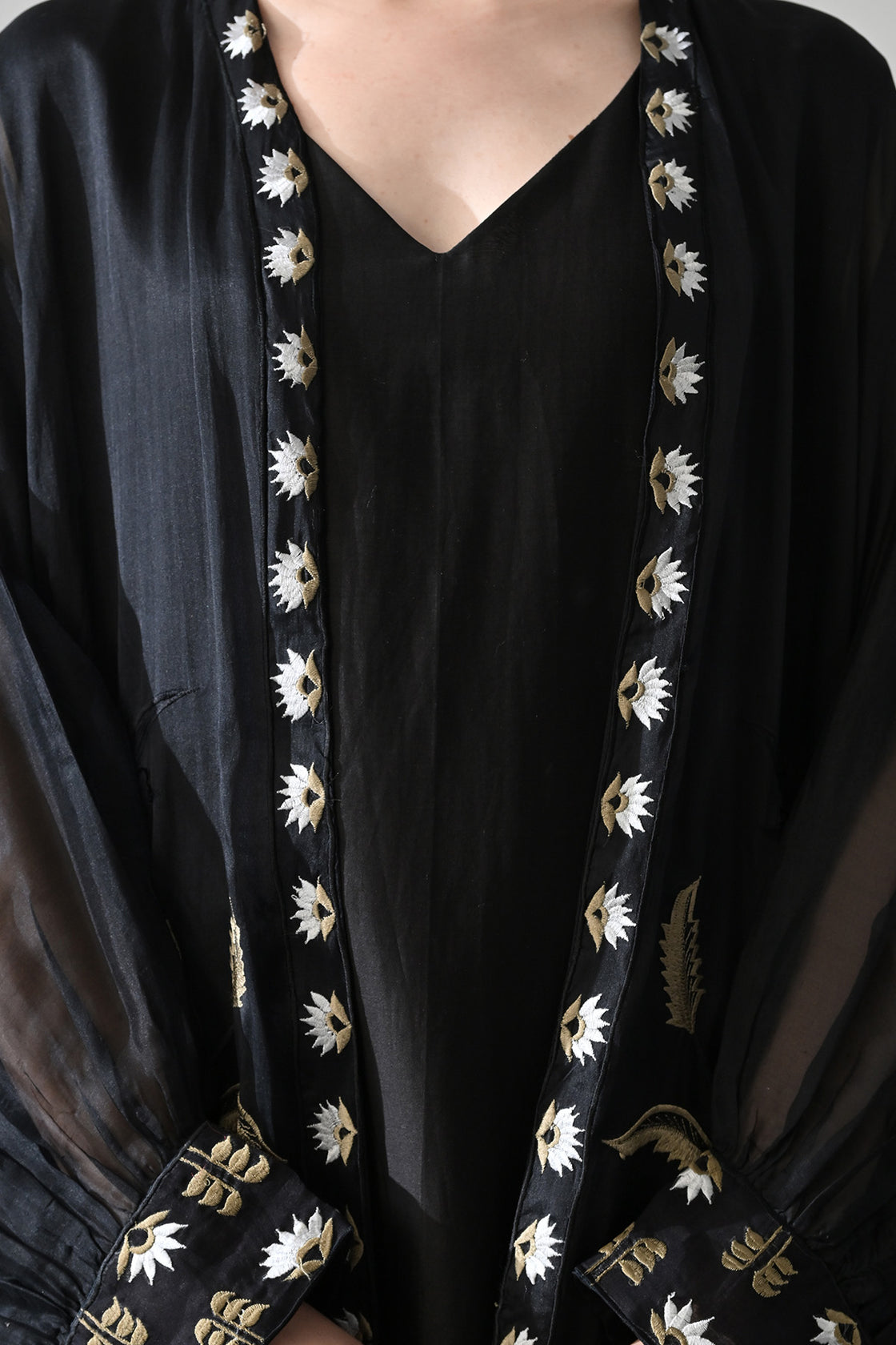 Black Kaftan With Handcrafted Borders And Fluid Silhouette