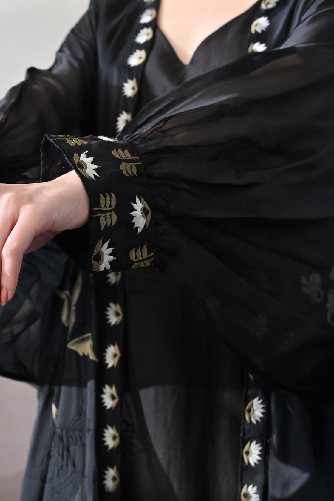 Black Kaftan With Handcrafted Borders And Fluid Silhouette