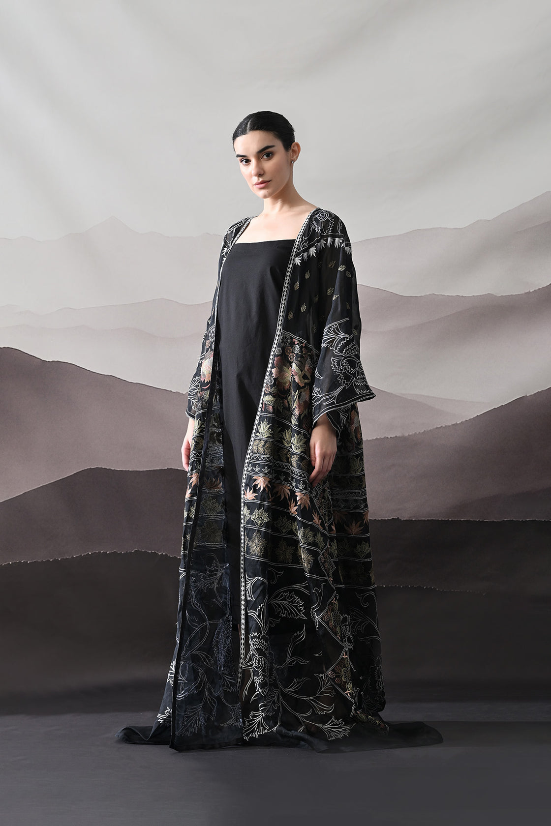 Black Kaftan With Artisanal Floral Placement And Fluid Construction
