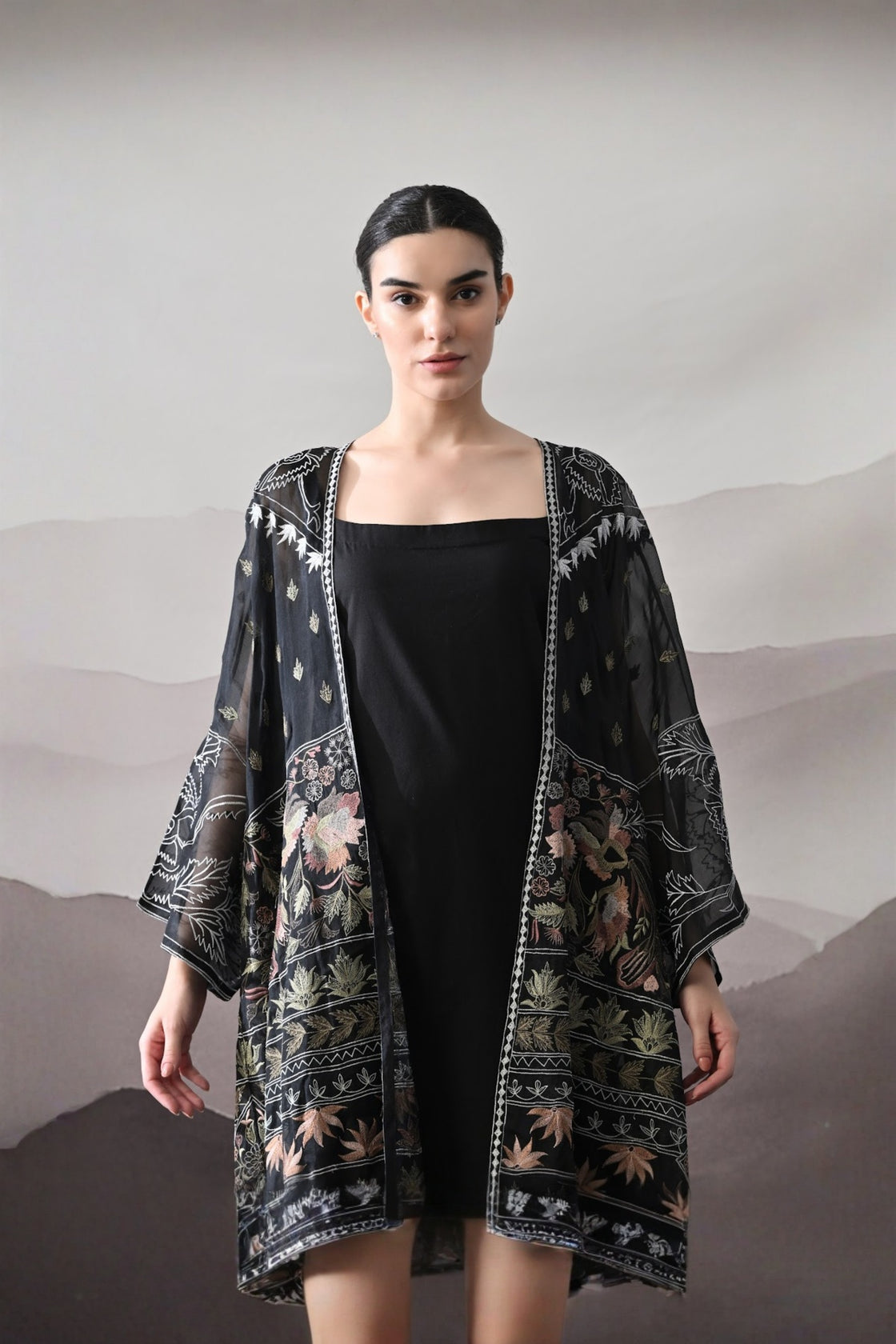 Black Kaftan With Artisanal Floral Placement And Fluid Construction