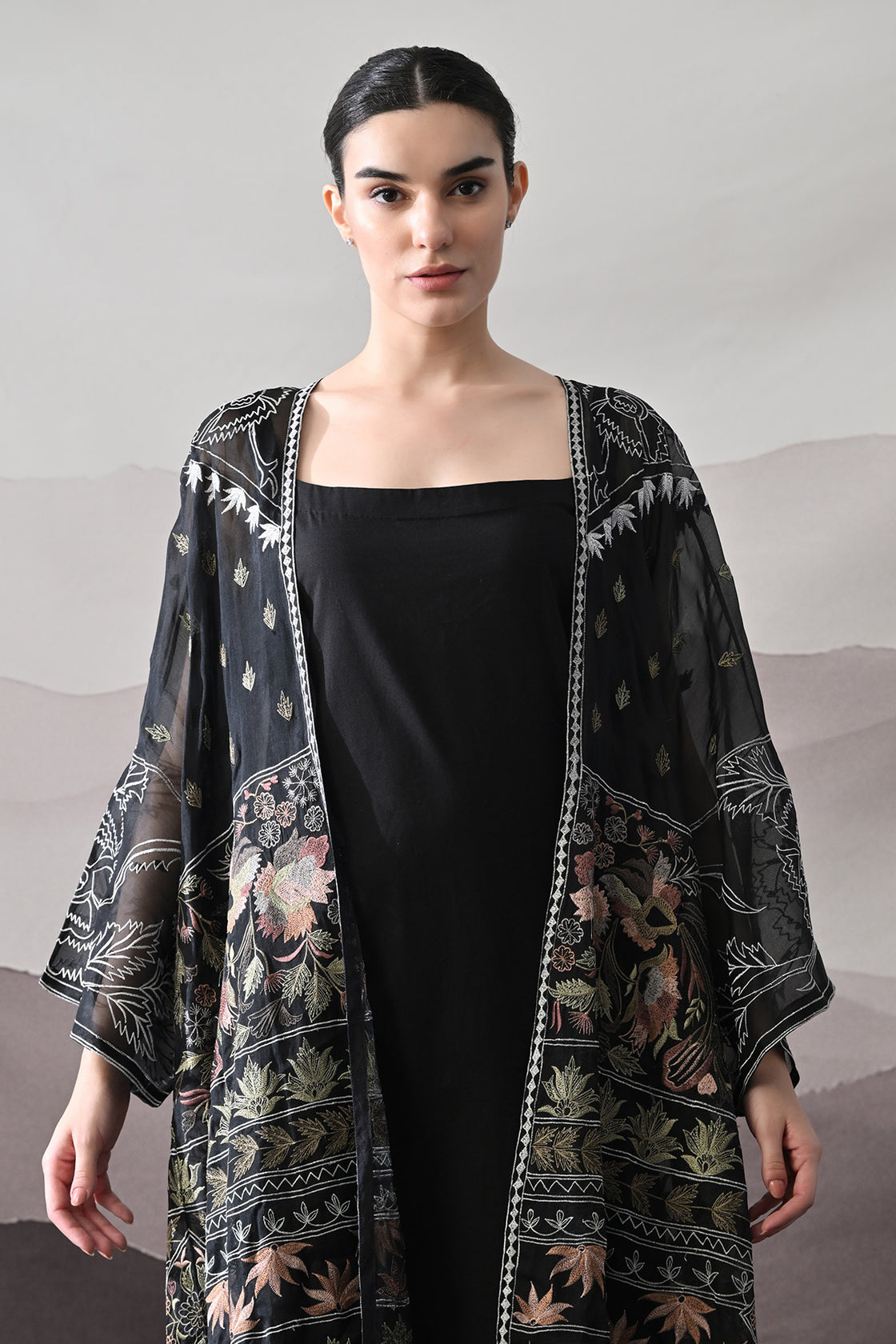 Black Kaftan With Artisanal Floral Placement And Fluid Construction