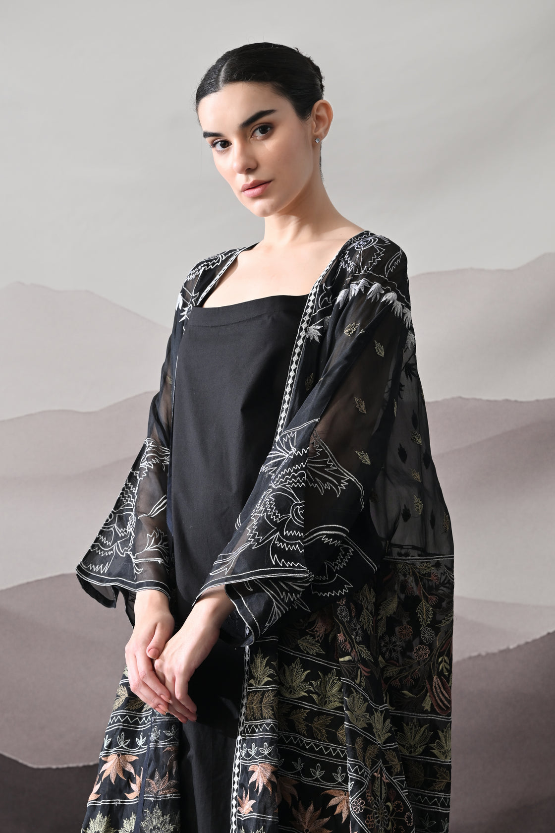 Black Kaftan with Artisanal Floral Placement and Fluid Construction