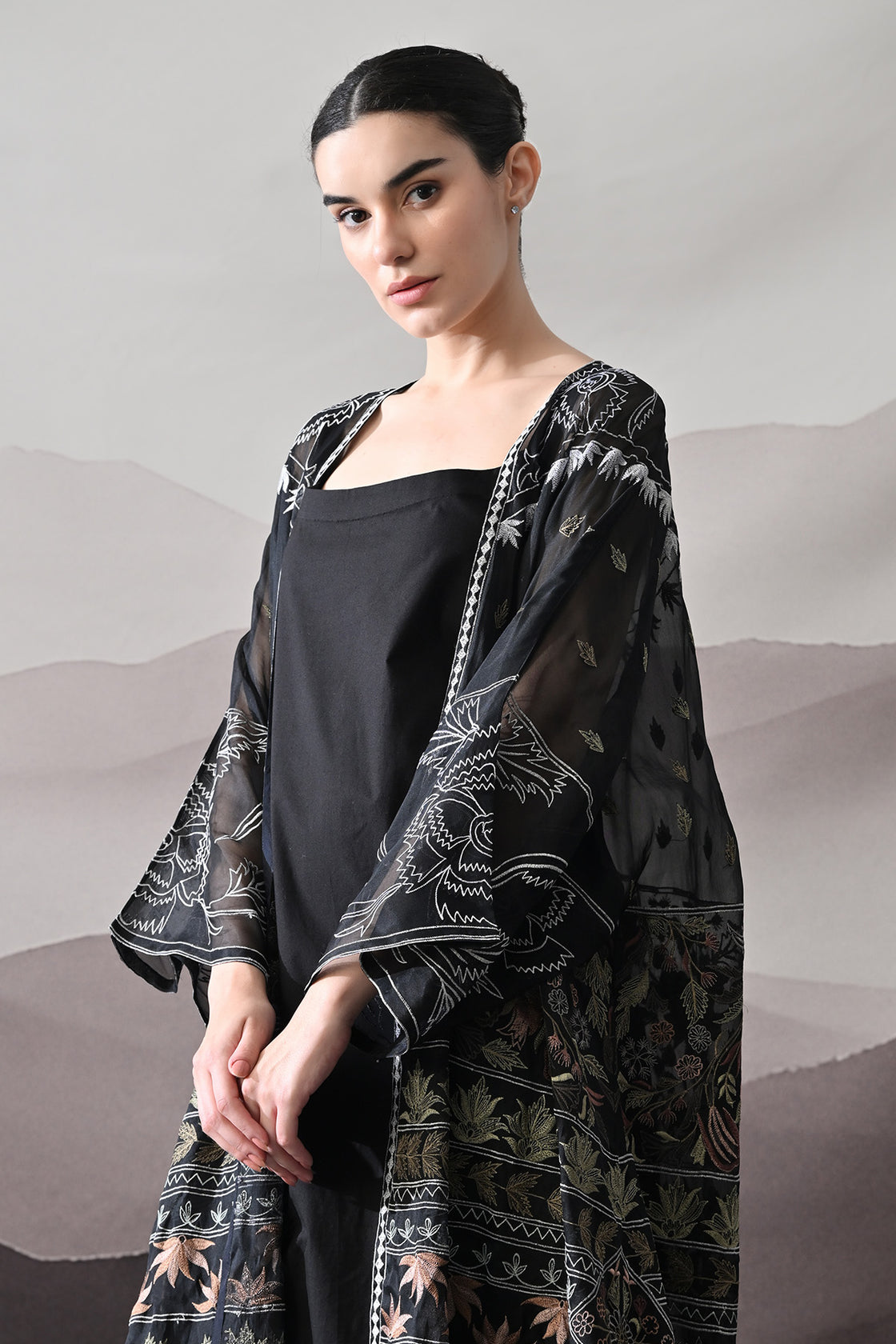 Black Kaftan With Artisanal Floral Placement And Fluid Construction