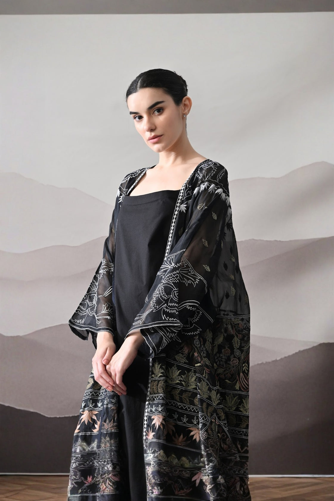 Black Kaftan With Artisanal Floral Placement And Fluid Construction
