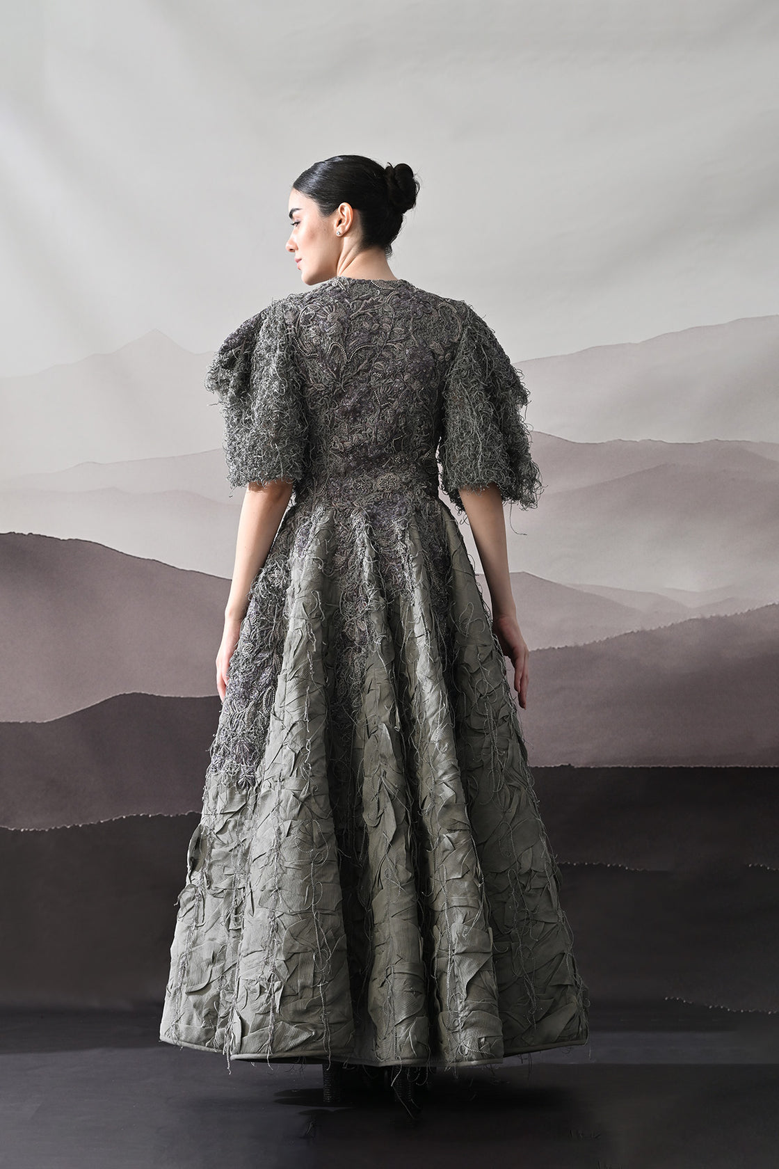 Grey Gown With Handworked Textural Embroidery And Crafted Volume