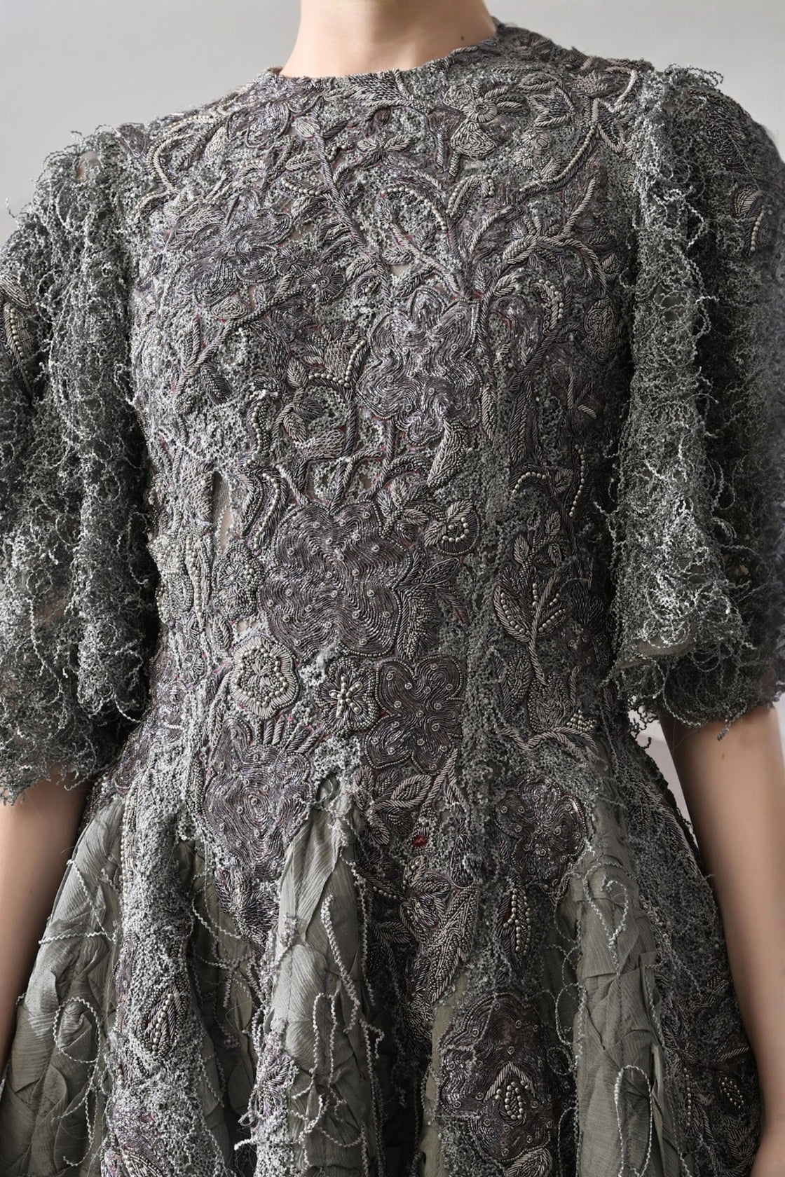 Grey Gown With Handworked Textural Embroidery And Crafted Volume