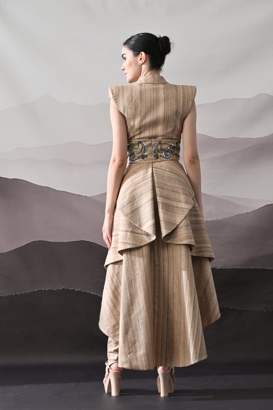 Beige Ensemble with Layered Construction and Embroidered Waist Accents
