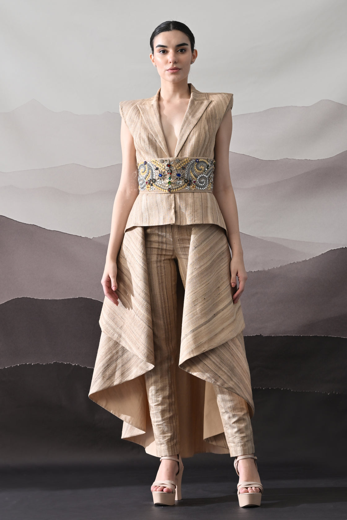 Beige Ensemble with Layered Construction and Embroidered Waist Accents