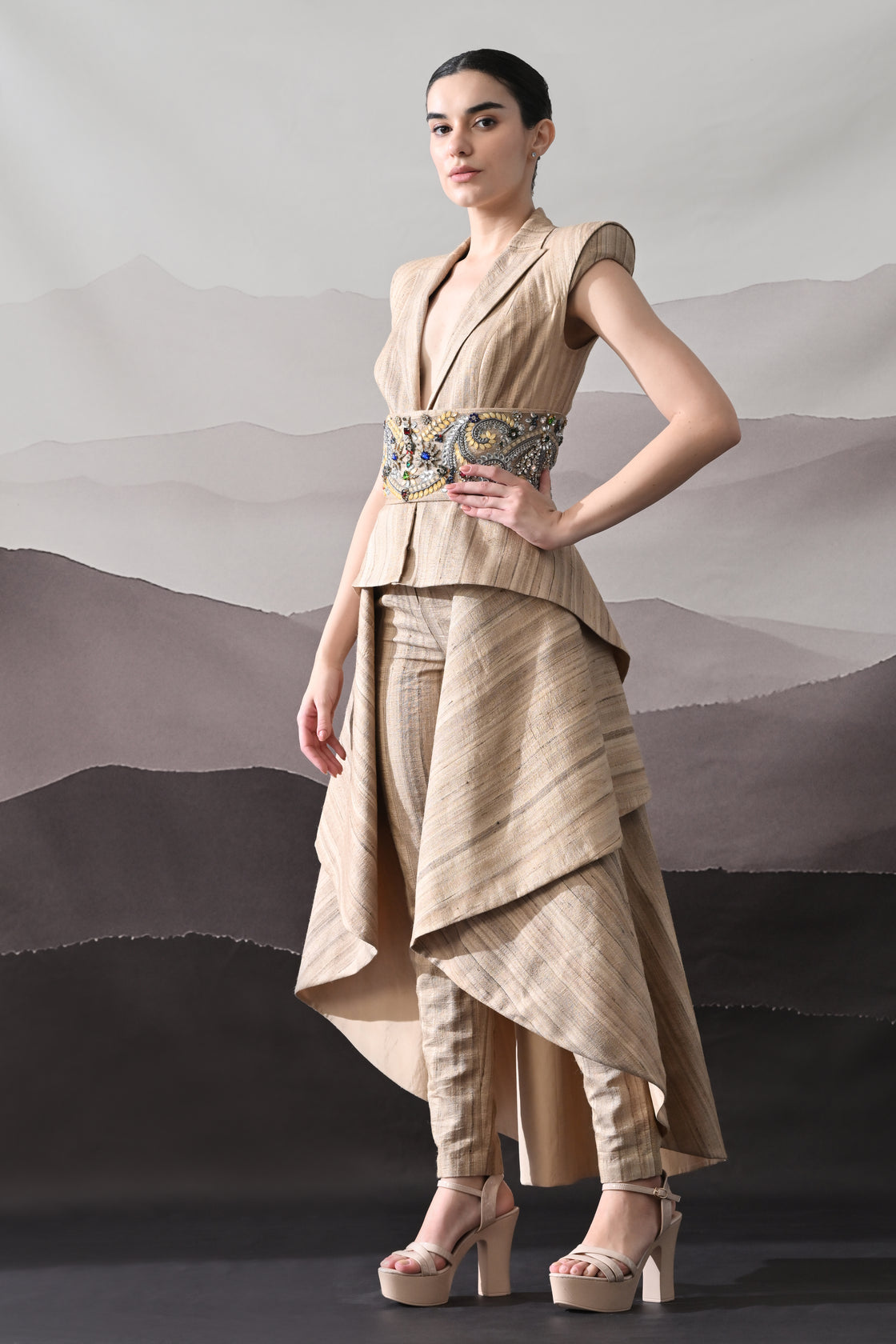 Beige Ensemble with Layered Construction and Embroidered Waist Accents