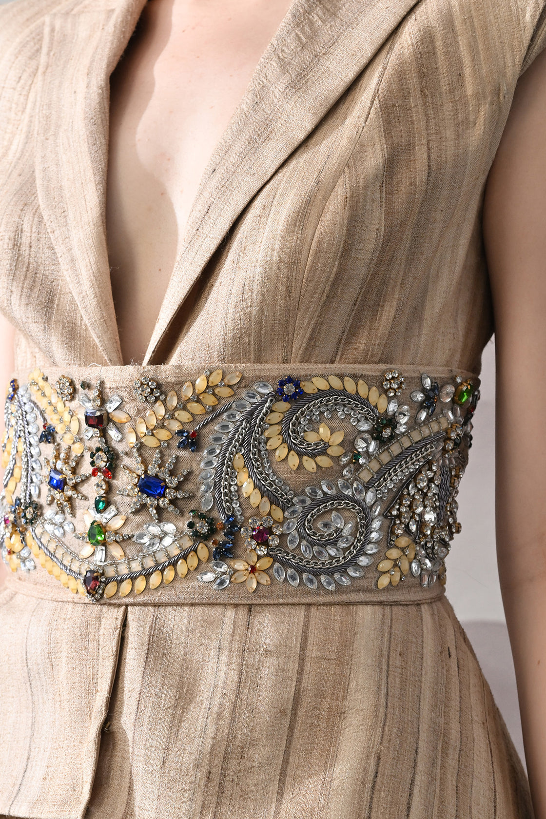 Beige Ensemble With Layered Construction And Embroidered Waist High Low Top With Straight Pants